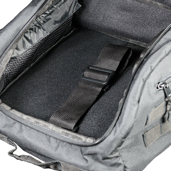 Gray backpack interior with black straps and zippers