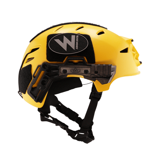 Yellow helmet with black accents and a visible brand logo on a white background