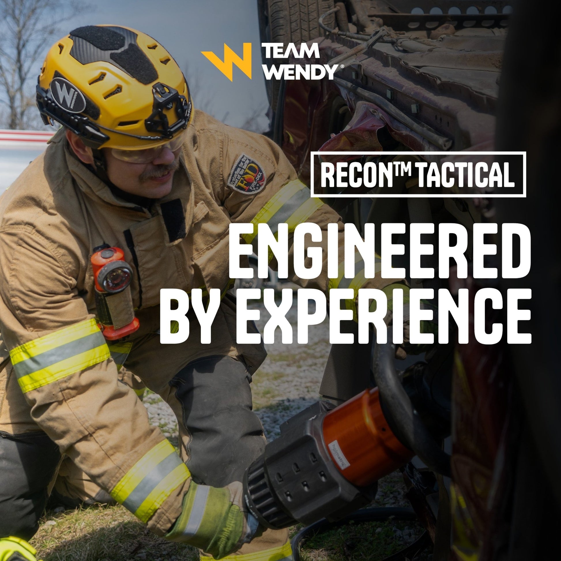 Person in tactical gear with 'Team Wendy' and 'Recon Tactical' branding.