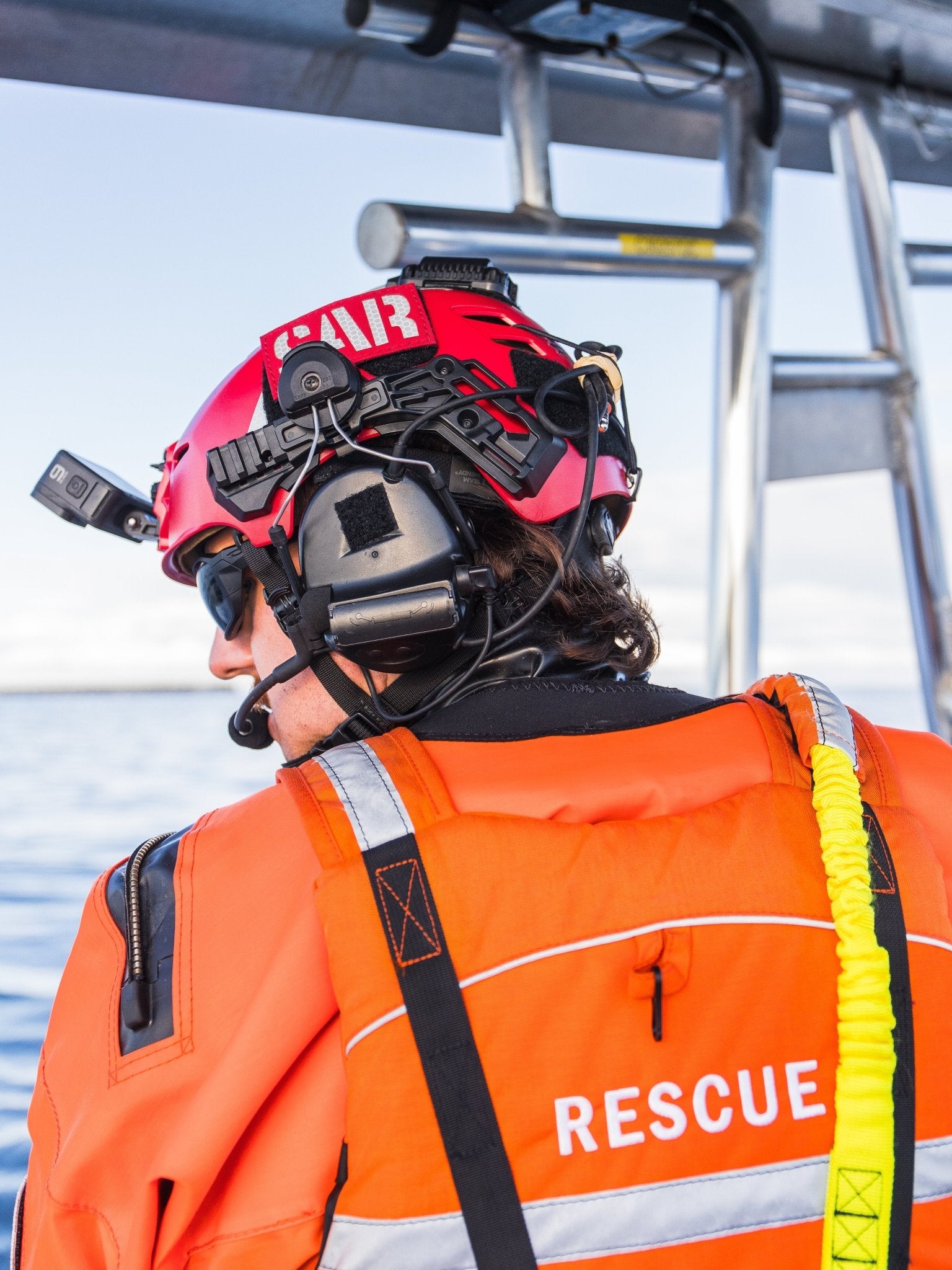 Water Rescue Man wearing red Team Wendy Helmet
